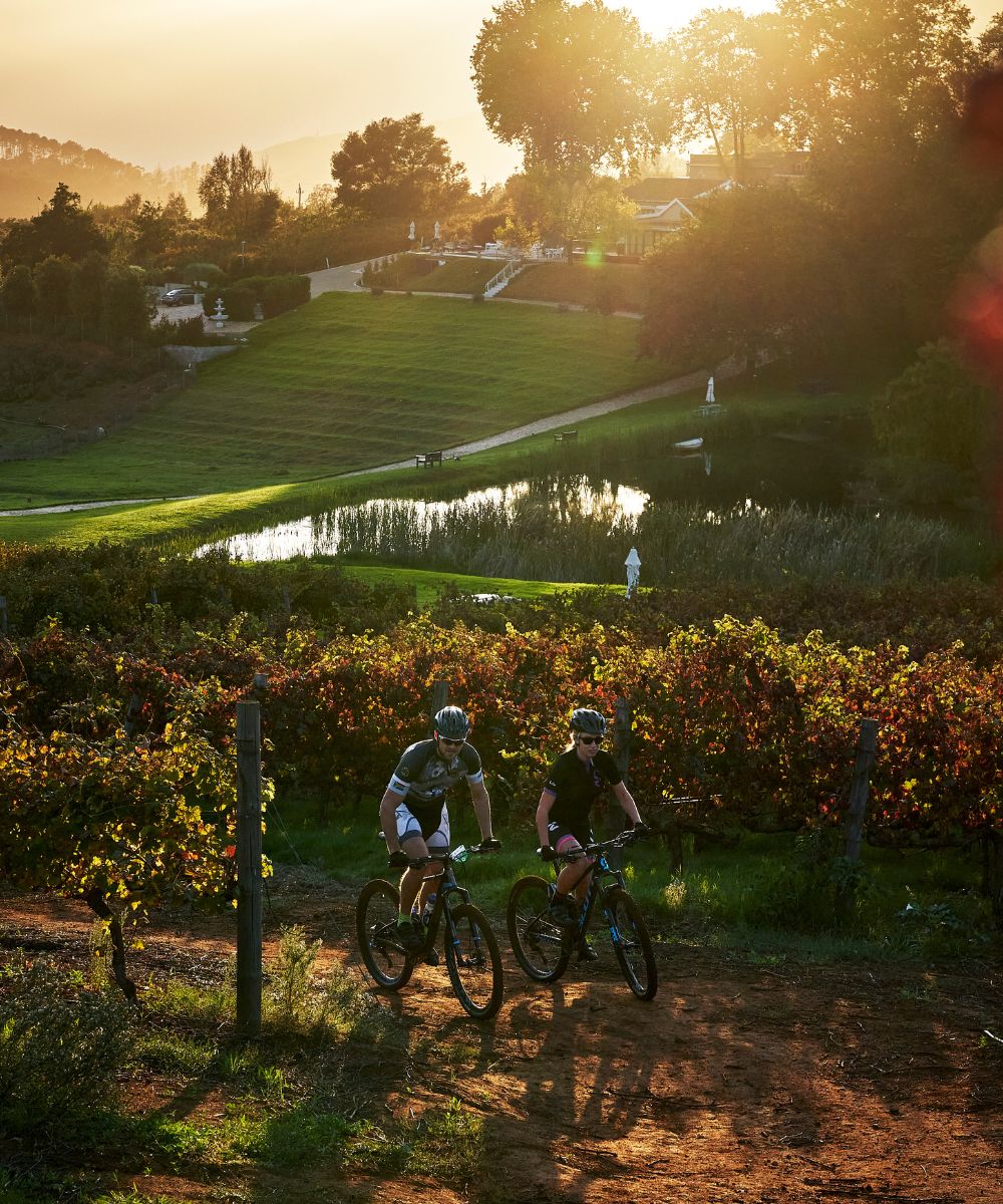 man and woman mountain biking